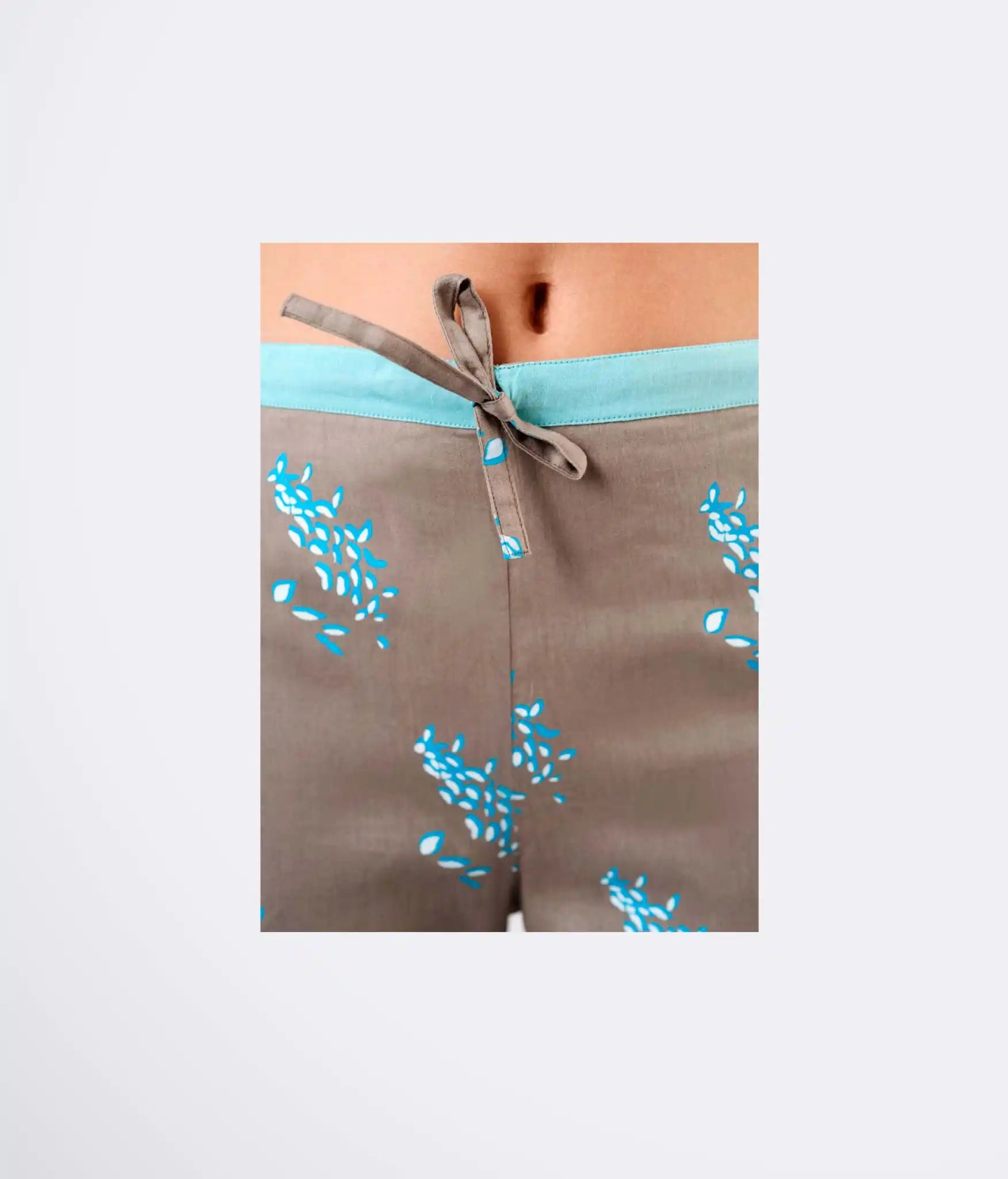 Coba Sewing pattern trousers with blue floral patterns 